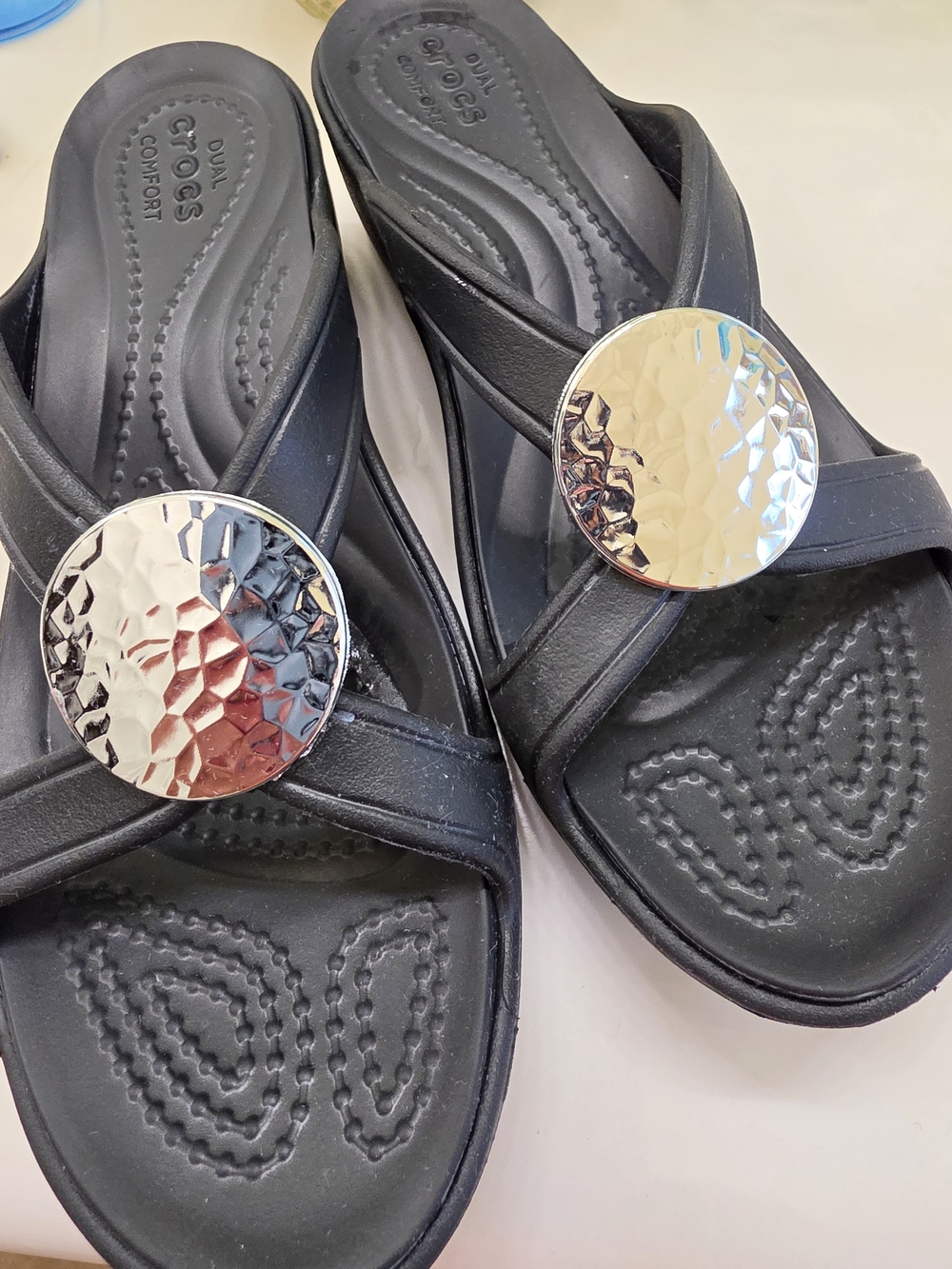 Crocs Women’s Black Slide Sandals with Silver Accent